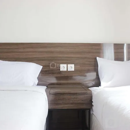 Modern & Relaxing 1Br Apartment At Parahyangan Residence Near Parahyangan Catholic University By Travelio